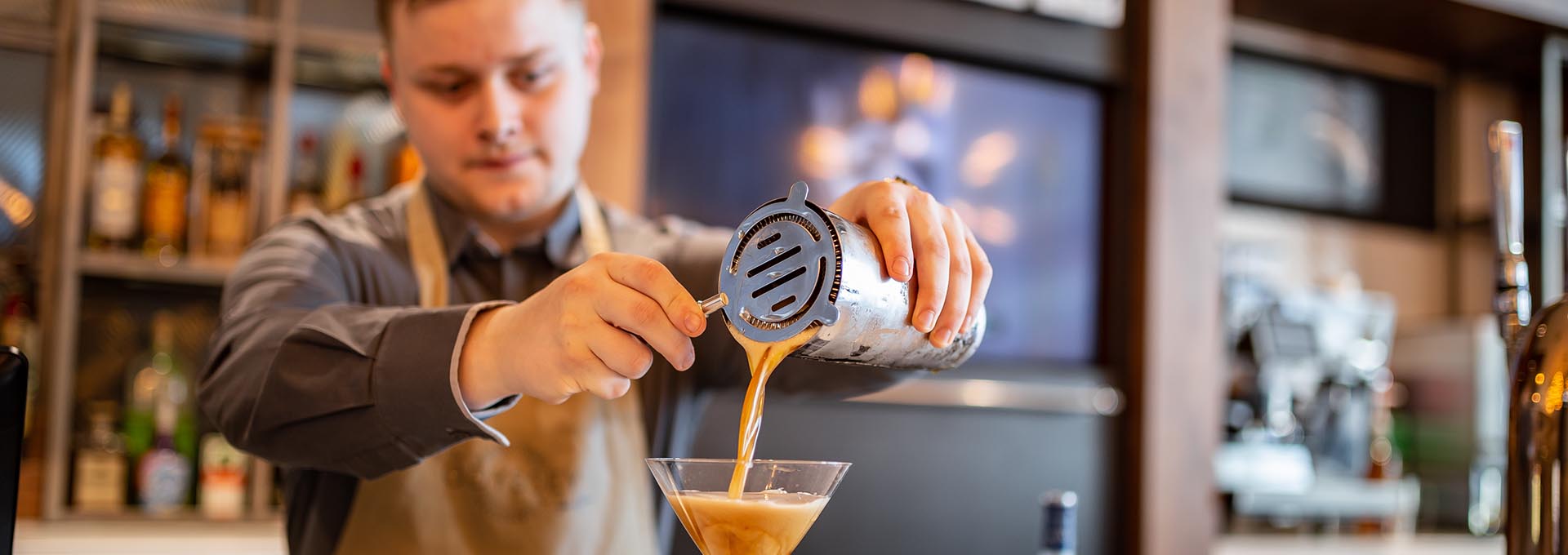 pouring a cocktail