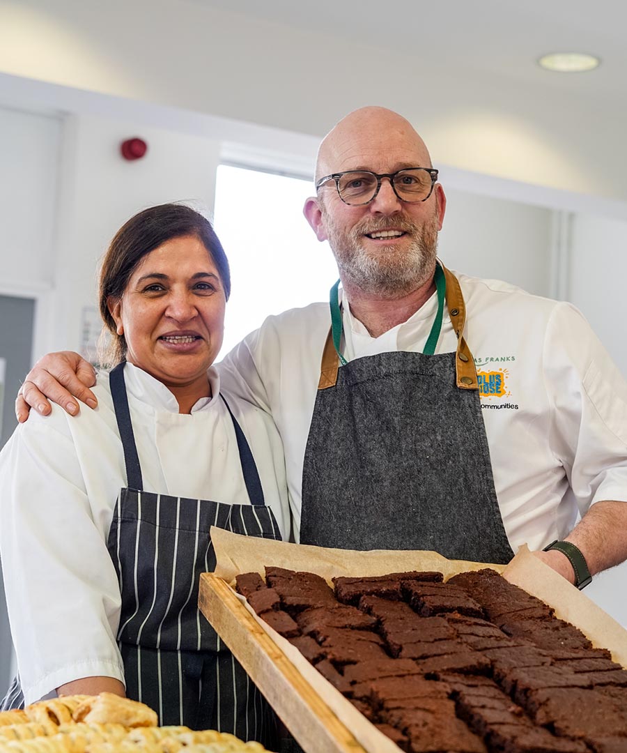 chefs with a tray of brownies